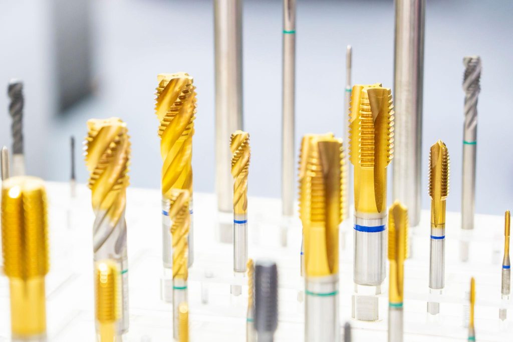 The Ultimate Guide to CNC Milling: Principles, Machinery, and Designing for Success 2 Dedicated tooling used for creating precision holes and internal threads in CNC machined components.