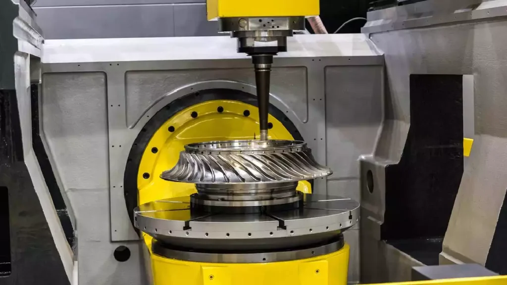 The Ultimate Guide to 5-Axis CNC Machining: From Kinematics to Supply Chain Modernization 3 Comparison of 3+2 axis and simultaneous 5-axis CNC milling applications, showing angled flat features machined with fixed tool orientations and complex free-form surfaces requiring continuous tool angle adjustment. The image highlights how different milling strategies are selected based on part geometry, from simple angled features to advanced components such as aerospace impellers.