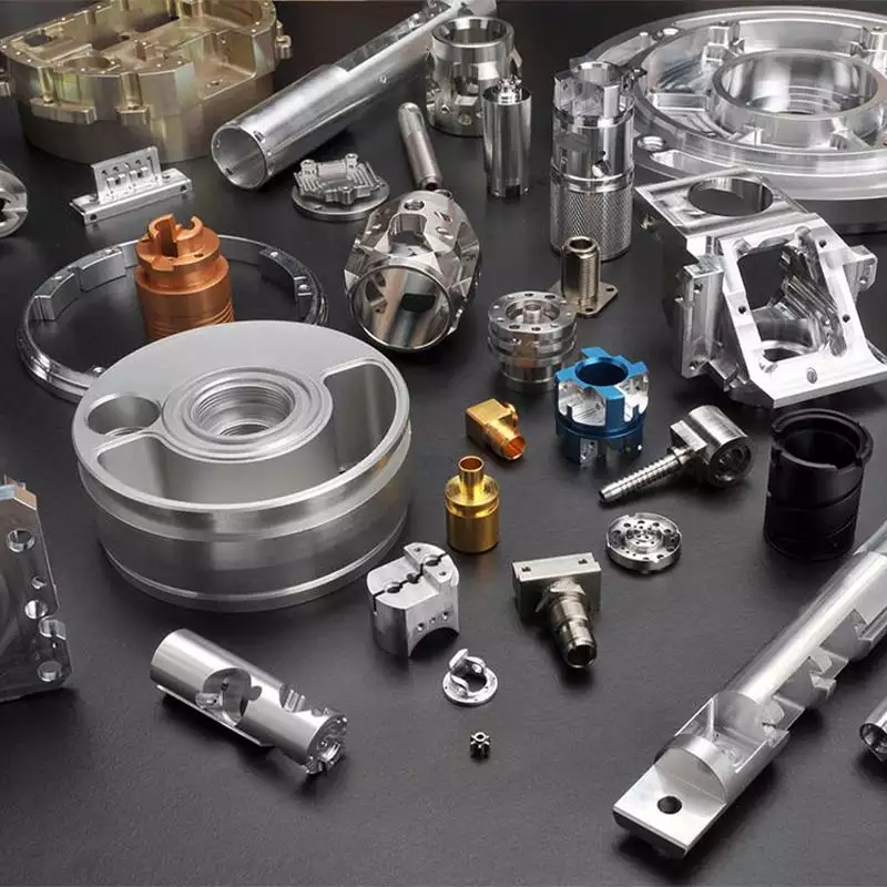 What is CNC Drilling? 7 A collection of precision CNC machined components featuring drilled holes used across multiple industries. The image highlights how CNC drilling supports accurate assembly, structural connections, and functional requirements in applications such as aerospace, automotive, industrial equipment, and medical devices.