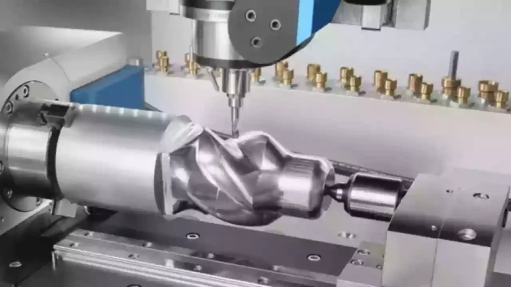 What is 3+2 Axis Machining? 1 Positional 3+2 axis machining in action. The rotary table/head tilts the workpiece to a specific angle and locks mechanically, while the spindle performs high-rigidity cutting using only the X, Y, and Z linear axes.