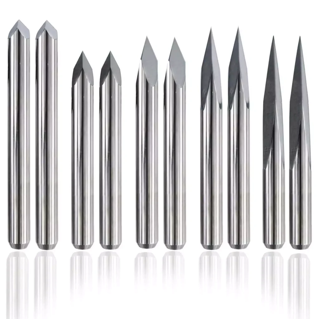 CNC Rotary Engraving: Process, Materials, Benefits, and Industrial Applications 2 Different rotary engraving cutters including carbide engraving bits and V-bit tools used for CNC engraving applications. Various cutter geometries allow control of engraving width, depth, and surface details.