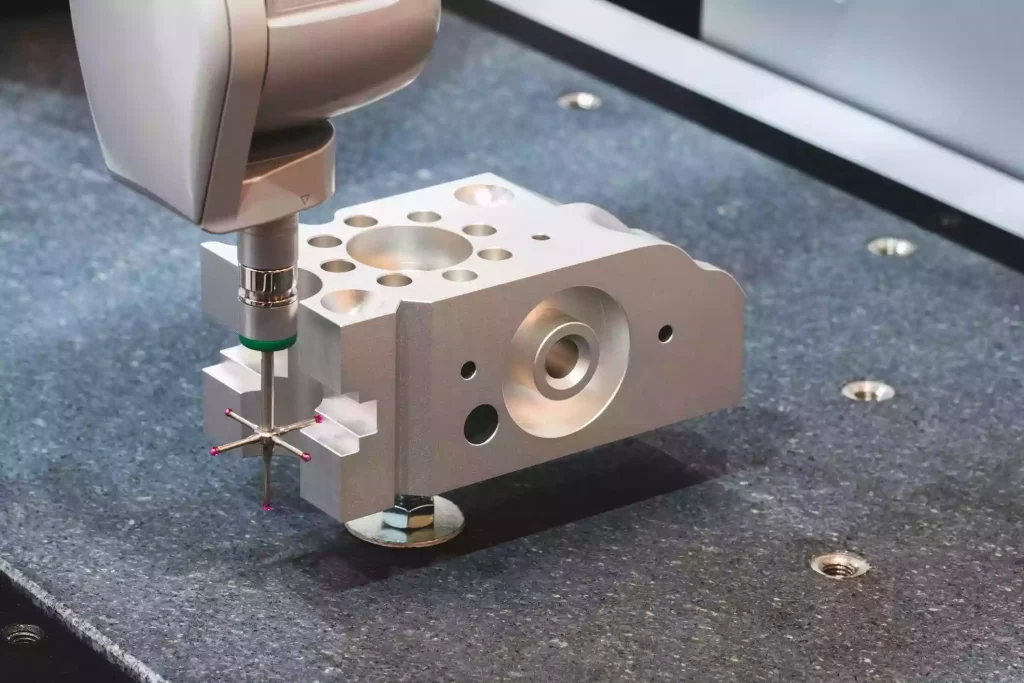 How to Design Parts for CNC Machining: Complete DFM Guidelines for Engineers 4 Precision CNC machined part inspected with CMM equipment to verify dimensional accuracy, tolerances, and manufacturing quality.