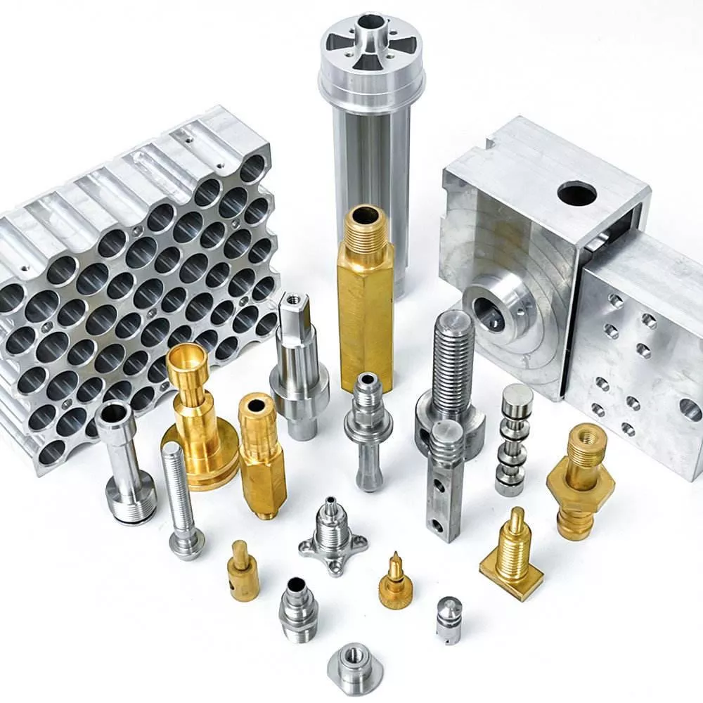 What Types of Materials Can Be Processed Using CNC Machines? 1 CNC machined metal components made from common materials such as aluminum, steel, stainless steel, brass, copper, and titanium, highlighting the variety of metals used in CNC machining.
