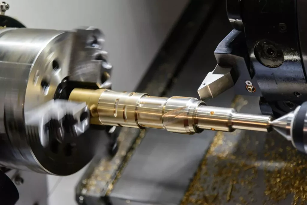 What Is the Easiest Material to Machine with CNC? 1 CNC machine shop metal machining brass aluminum steel components milling turning chips industrial workshop